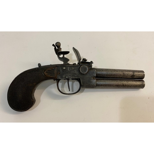 419 - A CONTINENTAL FLINTLOCK DOUBLE BARRELED PISTOL. A continental double over and under barreled pistol ... 