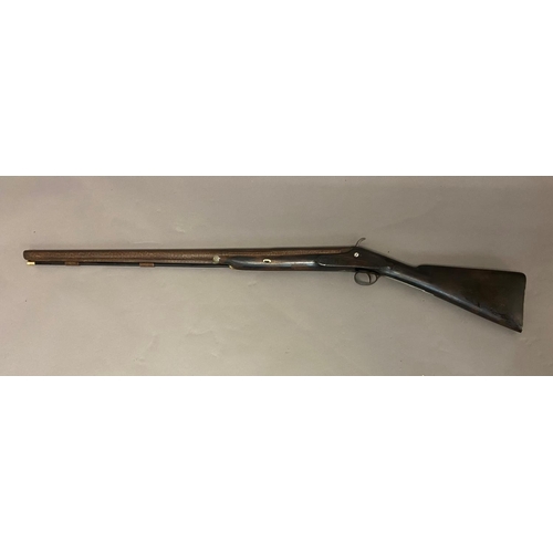 421 - A BIG GAME 10 BORE LONG GUN BY J & G GIBBS. A large bore single barreled big game gun, the damascus ... 