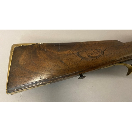 432 - A CONTINENTAL FLINTLOCK RIFLE. A continental rifle with an 84cm barrel tapering from octagonal to ci... 