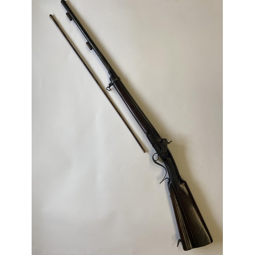 433 - A 19TH CENTURY SINGLE BARREL GERMAN SHOTGUN. With a 78.5cm barrel tapering from circular to octagona... 