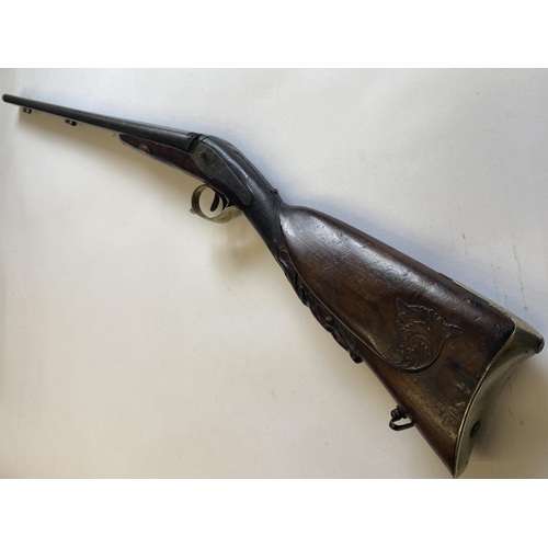 434 - A GERMAN DOUBLE BARREL MUZZLE LOADING SHOTGUN. With 79cm side by side barrels, marked in gilt to the... 