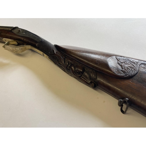 434 - A GERMAN DOUBLE BARREL MUZZLE LOADING SHOTGUN. With 79cm side by side barrels, marked in gilt to the... 