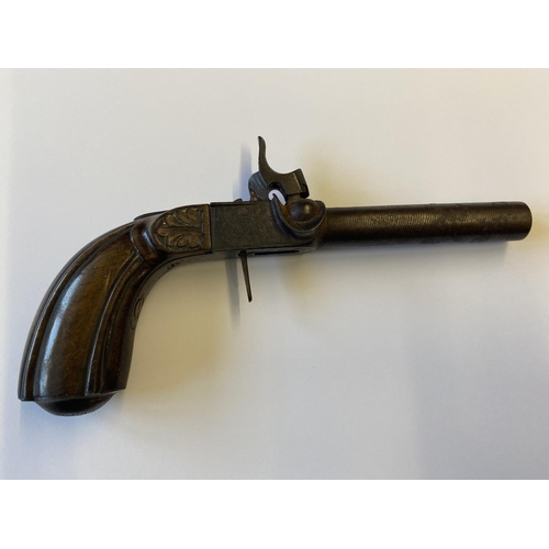 446 - A 19TH CENTURY WAISTCOAT PISTOL. A small percussion cap firing pistol with a damascus effect 7cm bar... 