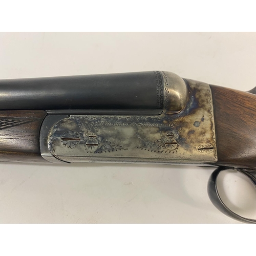 450 - A 20 BORE AYA DOUBLE BARREL SHOTGUN. A 20 bore side by side shotgun with ejector and sliding safety,... 