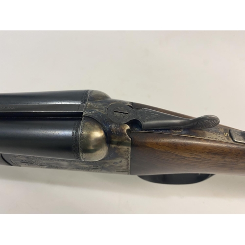 450 - A 20 BORE AYA DOUBLE BARREL SHOTGUN. A 20 bore side by side shotgun with ejector and sliding safety,... 