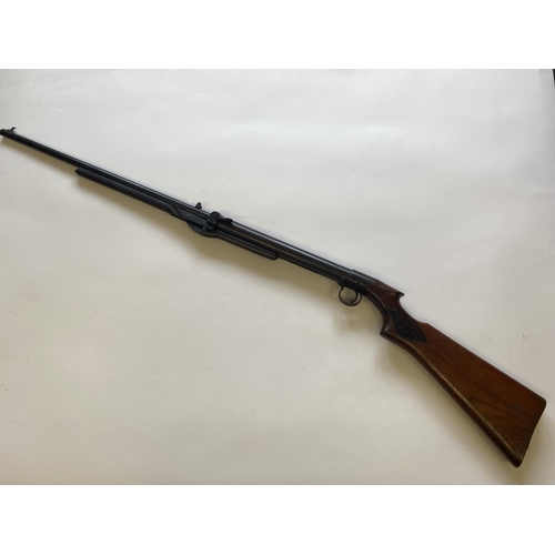 467 - A BSA .22 'T' MODEL AIR RIFLE. With a 49cm barrel with a rotating loading point, numbered T1161 abov... 