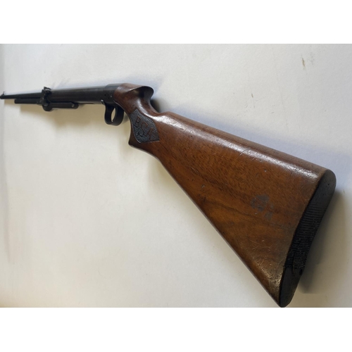 467 - A BSA .22 'T' MODEL AIR RIFLE. With a 49cm barrel with a rotating loading point, numbered T1161 abov... 