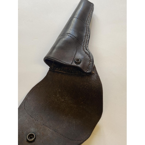 472 - A COLT BULLET MOULD AND LEATHER HOLSTER. A 44 calibre bullet mould and a leather pistol holster, the... 