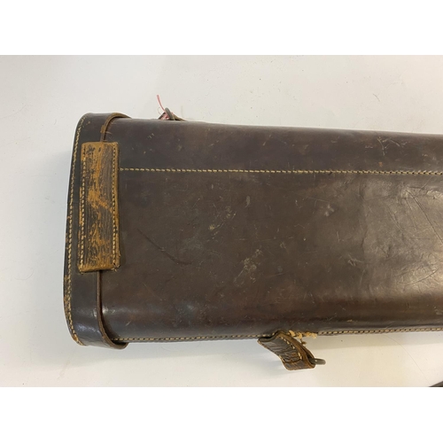 476 - A LEATHER LEG O MUTTON GUN CASE. A brown leather gun case 78 x 24cm overall.