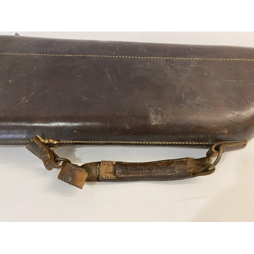 476 - A LEATHER LEG O MUTTON GUN CASE. A brown leather gun case 78 x 24cm overall.