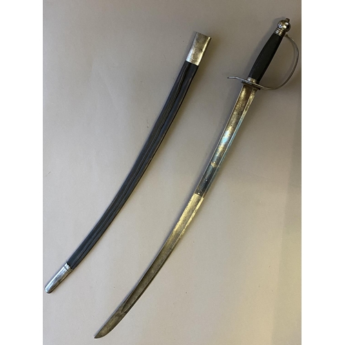 488 - AN UNUSUAL SLOTTED HILT SABRE. With a 72cm curved single edged fullered blade, partially blued and d... 