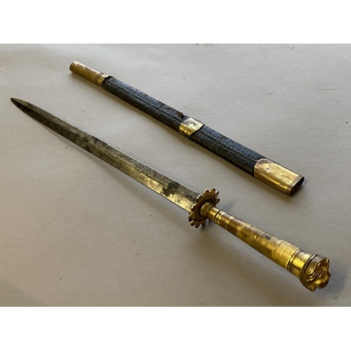 497 - A 19TH CENTURY NAVAL DIRK. With a 28cm straight pointed blade, lobbed circular brass guard and simil... 