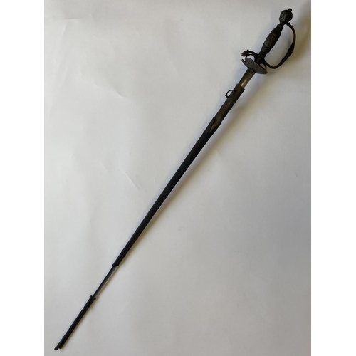 525 - AN EARLY 19TH CENTURY COURT SWORD. With a 79cm triform blade marked WSH, with an oval guard and wood... 