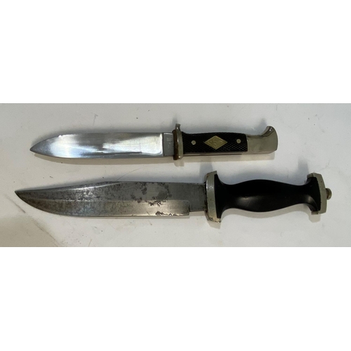 540 - A SECOND WORLD WAR OR LATER SS STYLE DAGGER BY WHITBY OF SOLINGEN AND ANOTHER. A German fighting kni... 