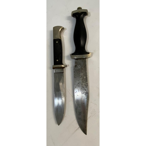 540 - A SECOND WORLD WAR OR LATER SS STYLE DAGGER BY WHITBY OF SOLINGEN AND ANOTHER. A German fighting kni... 