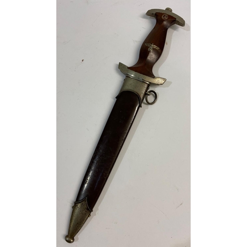 543 - A SECOND WORLD WAR GERMAN SA DAGGER AND SCABBARD BY EICKHORN. An SA dagger with a 22cm pointed blade... 