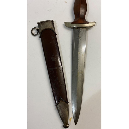 543 - A SECOND WORLD WAR GERMAN SA DAGGER AND SCABBARD BY EICKHORN. An SA dagger with a 22cm pointed blade... 