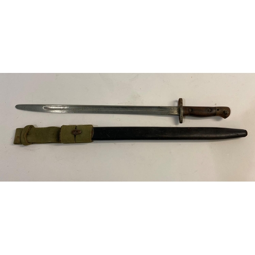 550 - A WILKINSON 1888 PATTERN BAYONET AND TWO OTHERS. An 1888 pattern bayonet with a 30.5xm pointed doubl... 