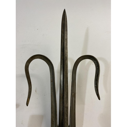 555 - A PAIR OF WALL SCONCES FORMED FROM SOCKET BAYONETS. A pair of three branch candle sconces of fleur-d... 