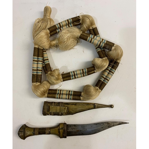 563 - A SMALL KNIFE AND SCABBARD AND HEAD DRESS BAND. An African knife with a double edged 14.5cm curved b... 