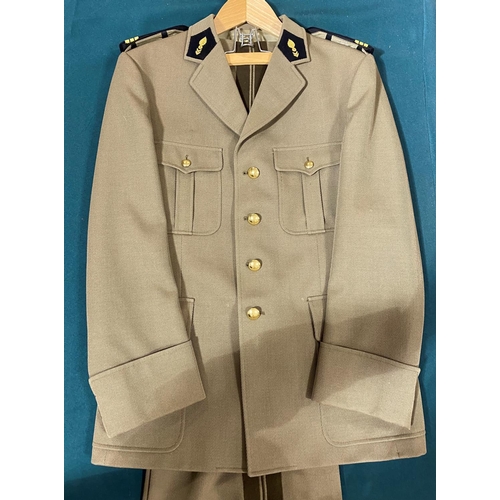 599 - A LATE 20TH CENTURY FRENCH OFFICERS UNIFORM. A jacket and trousers with the insignia for the rank of... 