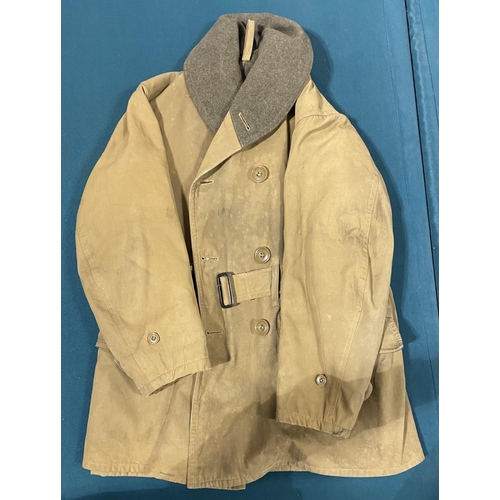 670 - A US ARMY ENLISTED MAN'S MACKINAW JACKET. A Second World War US Army Jacket with label 'Coat, Mackin... 