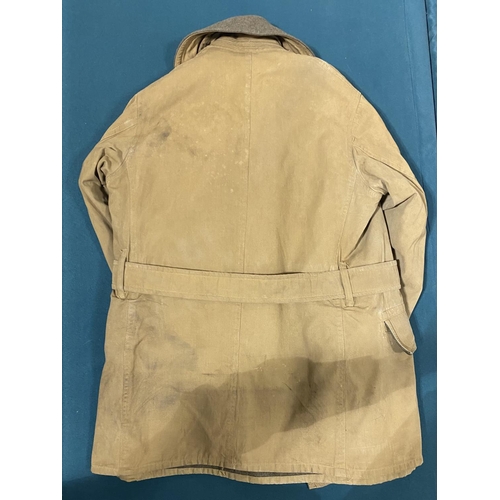 670 - A US ARMY ENLISTED MAN'S MACKINAW JACKET. A Second World War US Army Jacket with label 'Coat, Mackin... 