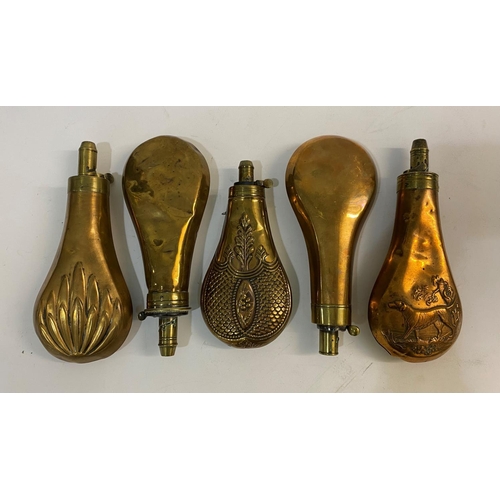 679 - A COLLECTION OF FIVE BRASS AND COPPER POWDER FLASKS BY SYKES AND OTHERS. A brass mounted powder flas... 