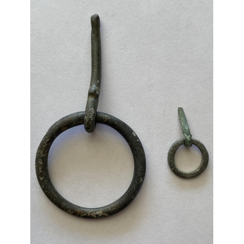 938 - A MEDIEVAL ANNULAR RING BROOCH AND ANOTHER. A Medieval Annular Ring Brooch, 13th-15th Century. The c... 