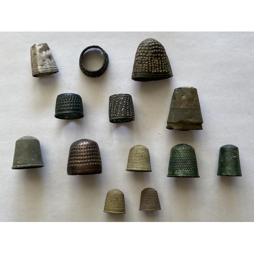 939 - A COLLECTION OF MEDIEVAL AND LATER THIMBLES. A collection of Medieval and Later Thimbles, 15th-19th ... 