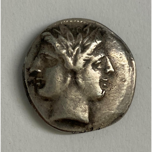 943 - A ROMAN REPUBLIC PERIOD SILVER DENARIUS. Roman Republic silver denarius, obverse with a figure possi... 