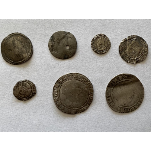 964 - A COLLECTION OF ELIZABETH I HAMMERED SILVER COINS. An Elizabeth I Shilling, rose behind crowned bust... 