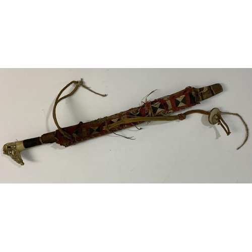 529 - A BORNEO 'HEAD HUNTERS' SWORD AND SCABBARD. A Dyack type 'Head Hunters' sword and scabbard with prof... 