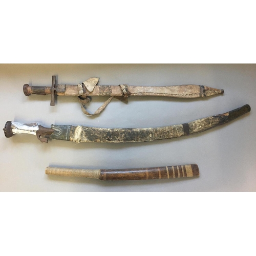 531 - A TULWAR TYPE SWORD AND SCABBARD AND TWO OTHERS. A 19th century Indian Tulwar sword with a 71cm curv... 