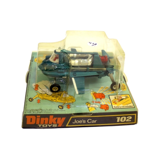 1507 - DINKY TOYS - JOE'S CAR 102 Joe's Car, in metallic green with red engine thruster and driver. In a bu... 