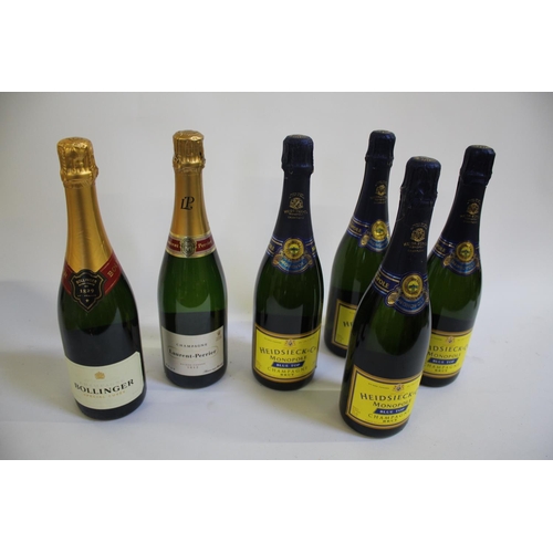 1892 - CHAMPAGNE including Bollinger Special Cuvee, Laurent-Perrier Maison Fondee 1812, and 4 bottles of He... 