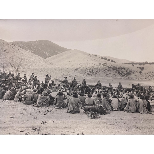 688 - A FOLDER OF MILITARY PHOTOGRAPHS OF AFGHAN TRIBES C1919. BY HOLMES AND Co. A collection of 63 photog... 