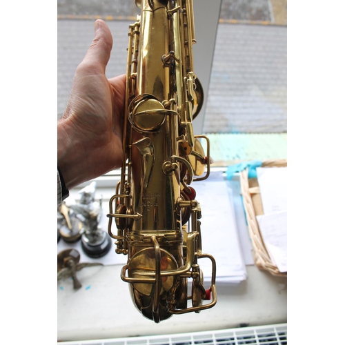 ELKHART ALTO SAXOPHONE a brass saxophone with a Lewington Alto Sax