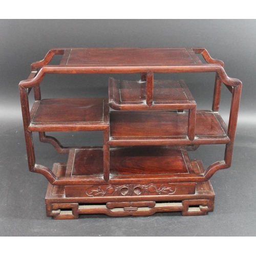 1004 - CHINESE HARDWOOD DISPLAY STAND possibly for snuff bottles, a hardwood display stand with shelves on ... 