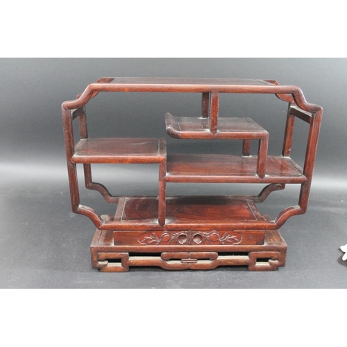 1004 - CHINESE HARDWOOD DISPLAY STAND possibly for snuff bottles, a hardwood display stand with shelves on ... 