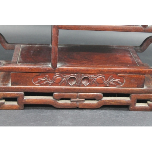 1004 - CHINESE HARDWOOD DISPLAY STAND possibly for snuff bottles, a hardwood display stand with shelves on ... 