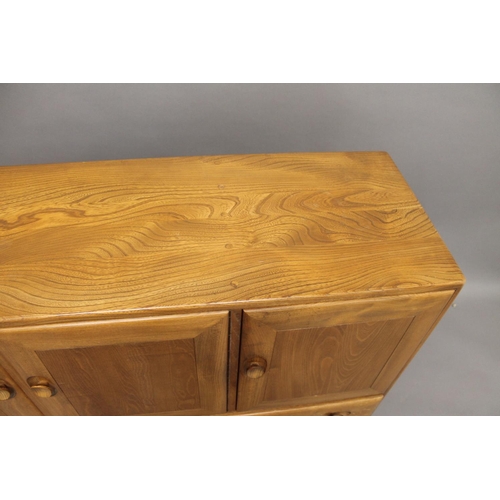 701 - ERCOL SIDEBOARD & DRESSING TABLE MIRROR a light elm sideboard with a two door cupboard and internal ... 