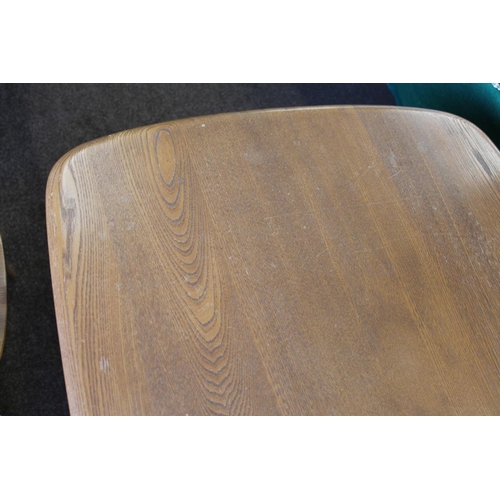 702 - ERCOL DINING TABLE & CHAIRS a light elm and beech dining table with splayed legs (151cms long), also... 