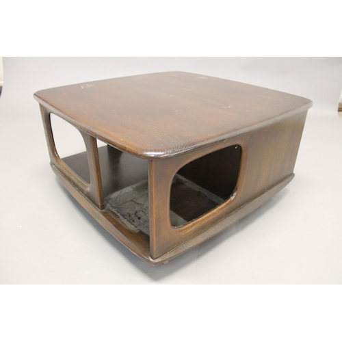 703 - ERCOL 'PANDORA' COFFEE TABLE a dark elm coffee table of square shape, with two drawers and with roll... 