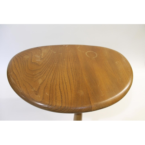 704 - ERCOL NEST OF TABLES - PEBBLE TABLES a set of three light elm and beech pebble coffee tables, one wi... 