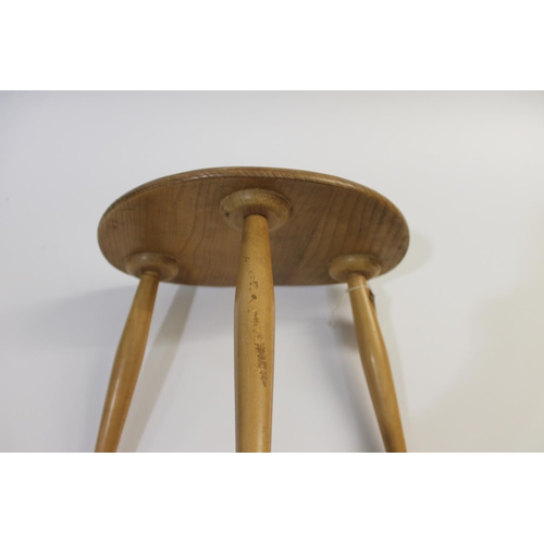 704 - ERCOL NEST OF TABLES - PEBBLE TABLES a set of three light elm and beech pebble coffee tables, one wi... 