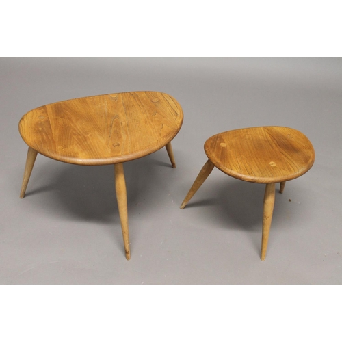 705 - ERCOL 'PEBBLE' TABLES 2 light elm and beech graduated side tables, unmarked. 48cms and 33cms across.... 