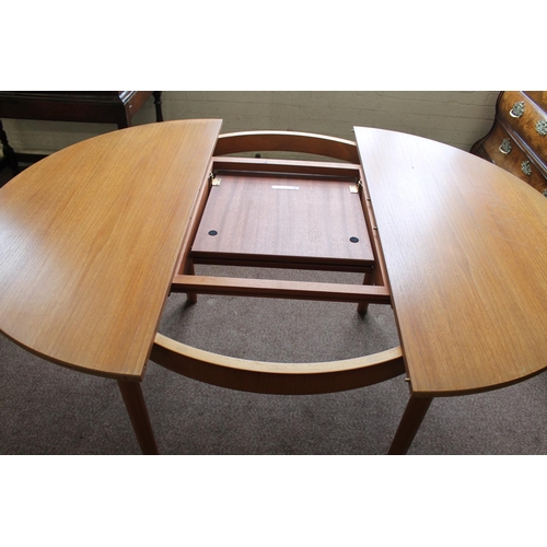 708 - A H MCINTOSH & CO 'MC' - RETRO DINING TABLE & CHAIRS a teak circular extending teak dining table wit... 