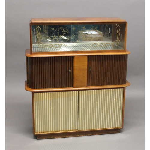 718 - RETRO COCKTAIL CABINET - 'RIVINGTON CABINET WORKS' a large walnut veneered cabinet, with glass slidi... 