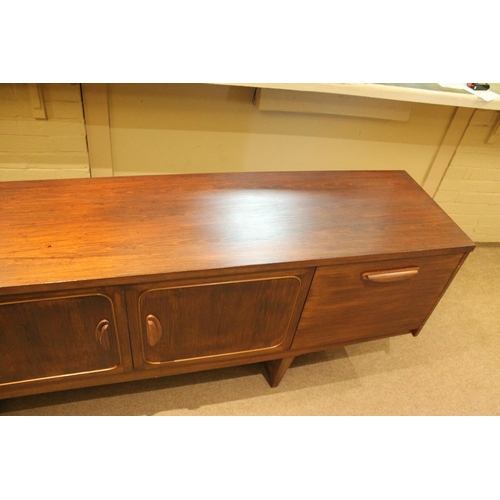 719 - RETRO 'STATEROOM' TEAK SIDEBOARD - STONEHILL FURNITURE a large teak sideboard with a central two doo... 